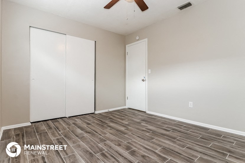the living room of our studio apartment atrium with two closets