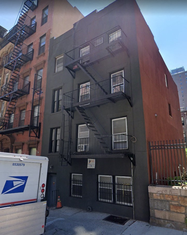 a building with a fire escape on the side of it