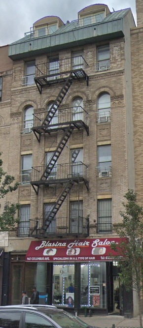 a building with a fire escape on the side of it