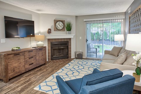the preserve at ballantyne commons living room with fireplace and couch