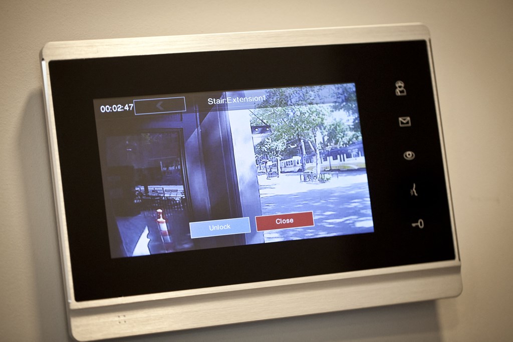 a tablet screen with a video of a fire hydrant on it