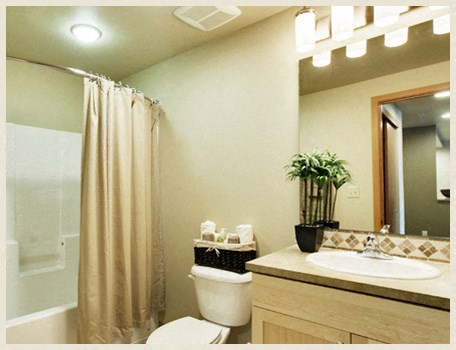 a bathroom with a sink toilet and a shower