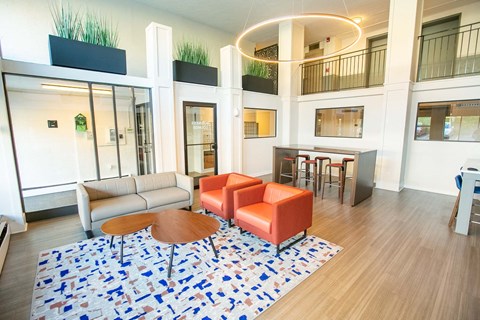 a rendering of a living room with couches and a table