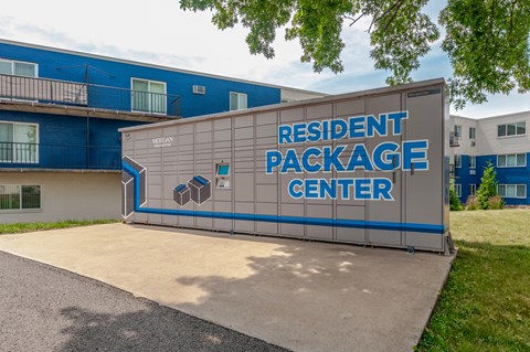 the exterior of a building with the resident package center sign