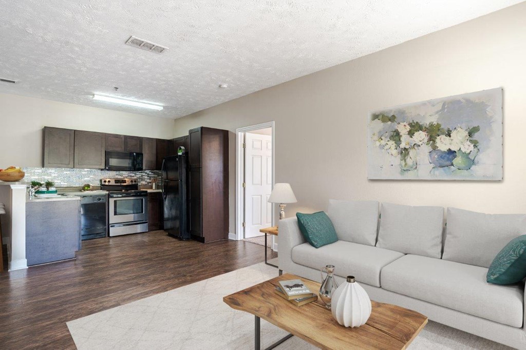 a living room with a couch and a table