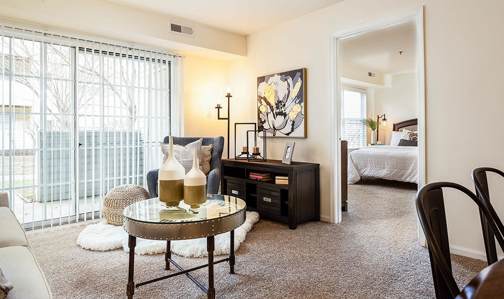 a living room with a couch and a table