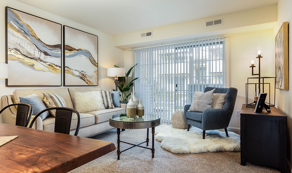 a living room with a couch and a table