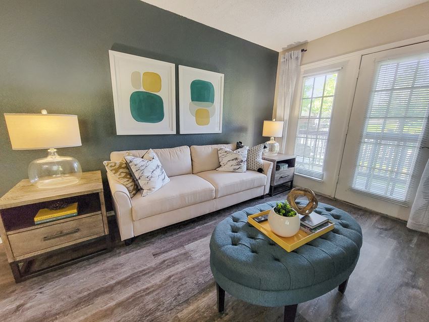 a living room with a couch and a table
