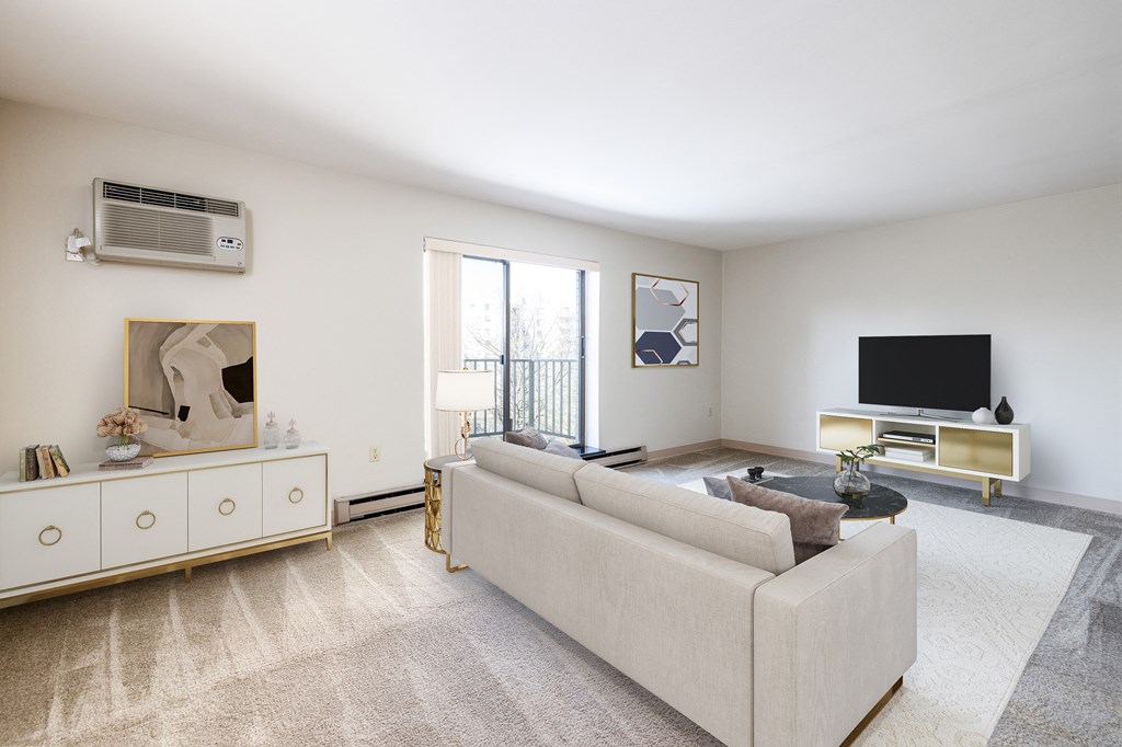 a living room with a couch and a tv