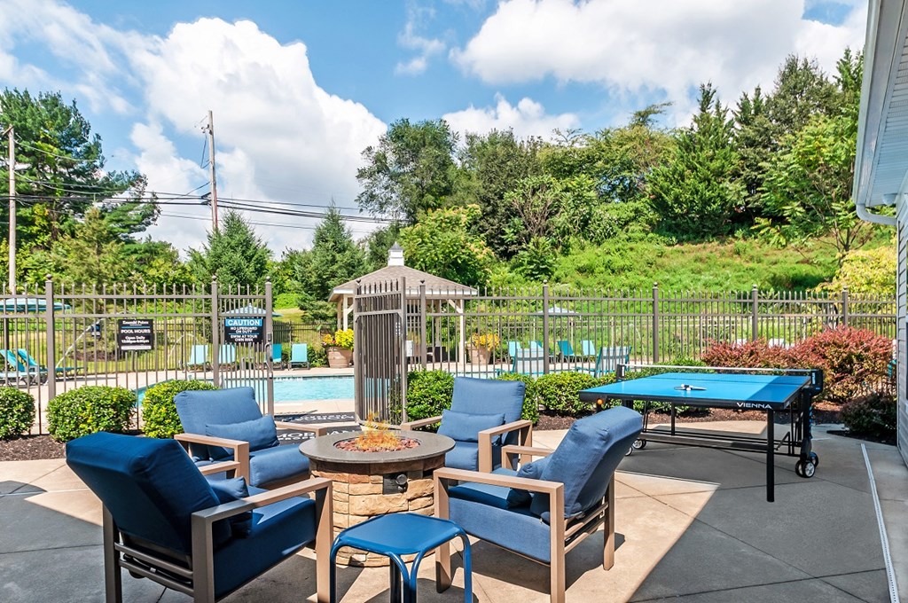 clubhouse patio with pool table and chairs at the preserve at ballantyne commons