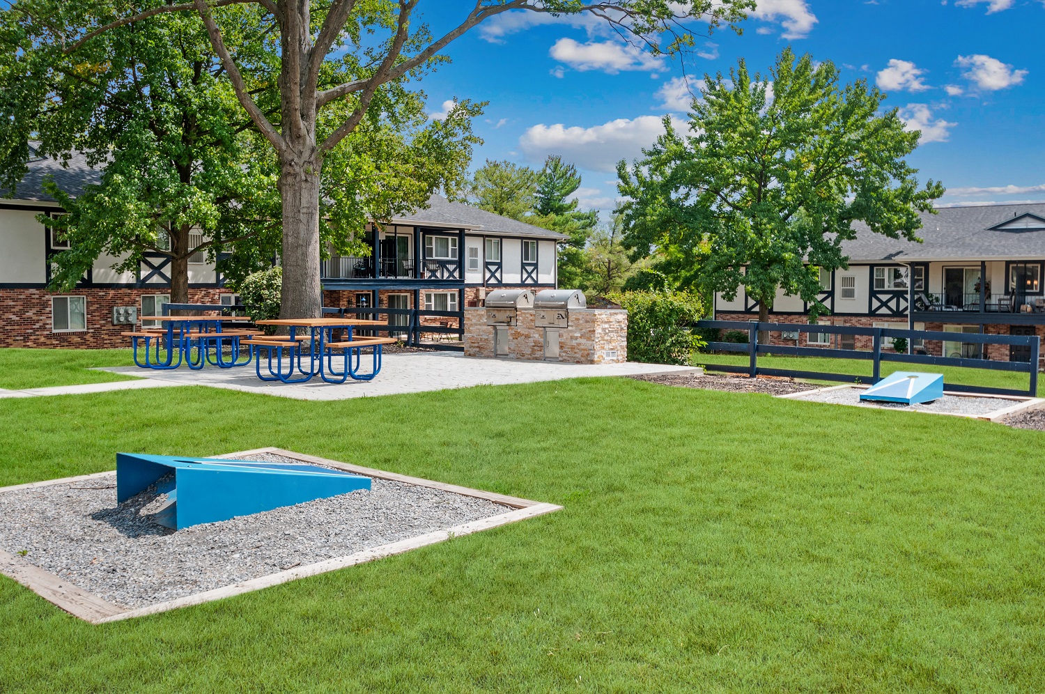 our apartments have a large yard with a playground and picnic table