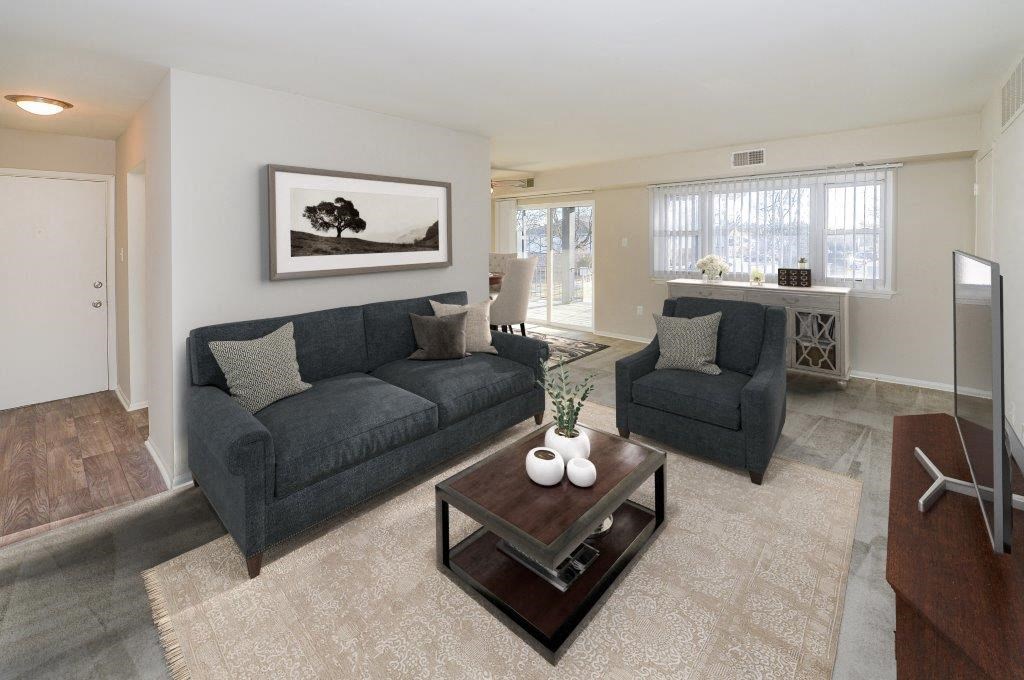 a living room with a couch and a coffee table