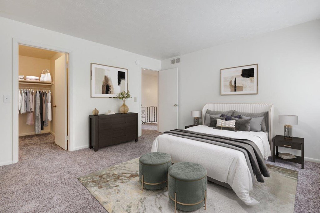 a bedroom with a bed and a closet