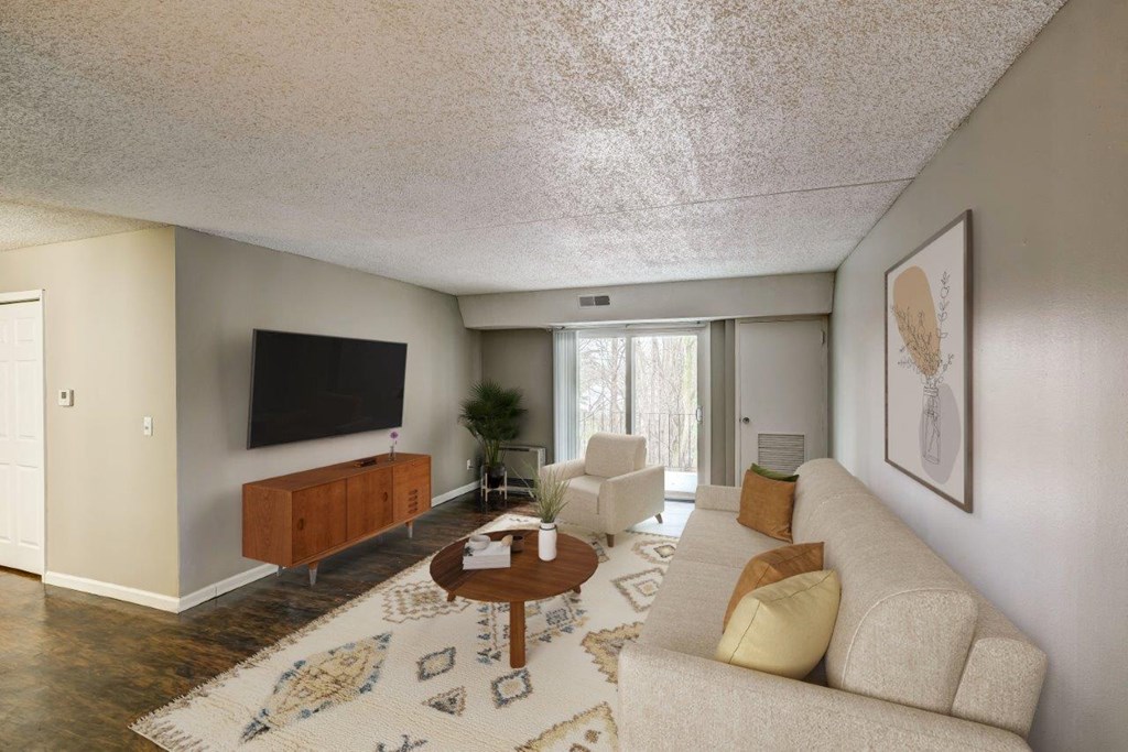 a living room with a couch and a table