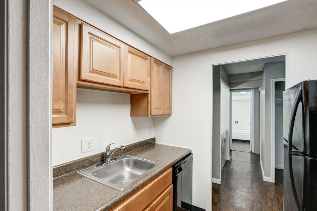 our apartments offer a kitchen with a sink and a refrigerator