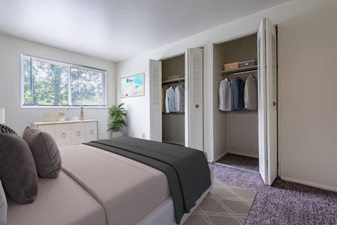 a bedroom with a bed and a closet