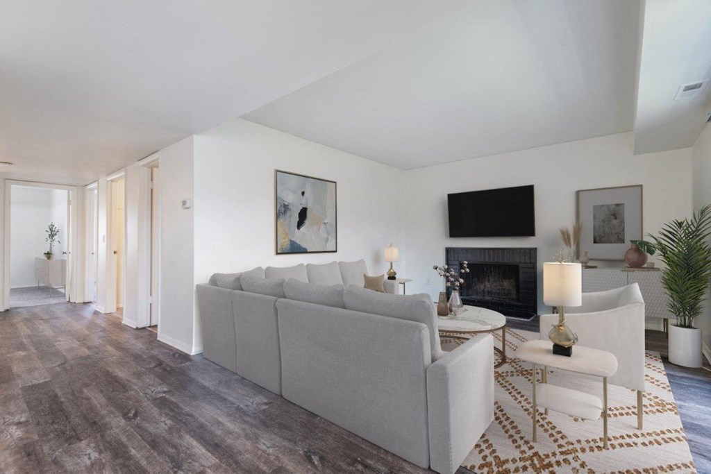 a living room with a couch and a table