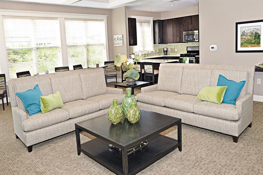resident clubroom with couches and chairs