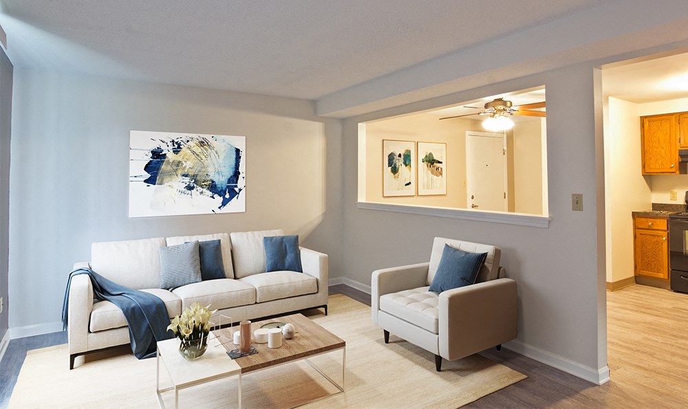 a living room with couches and a coffee table