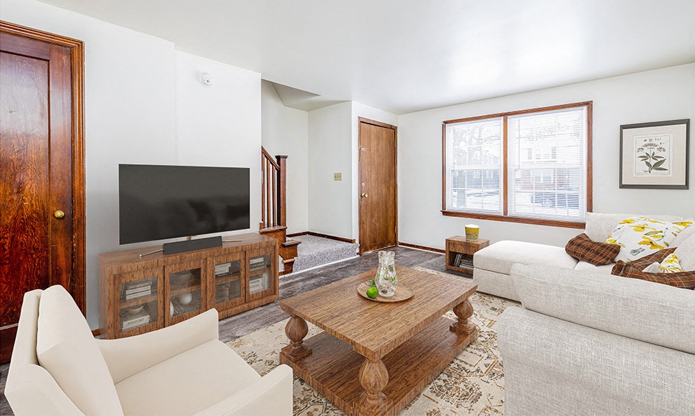 a living room with a couch and a television