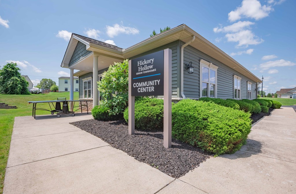 a building with a community center sign in front of it