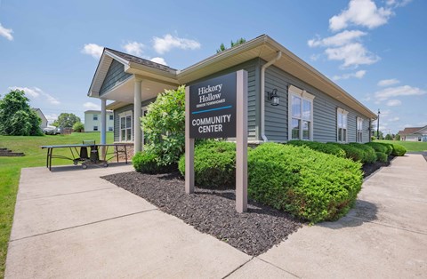 a building with a community center sign in front of it