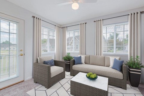 a living room with a couch and a table