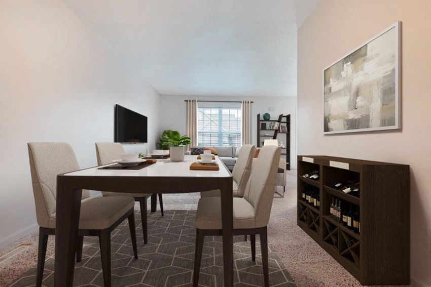 a dining room and living room with a table and chairs