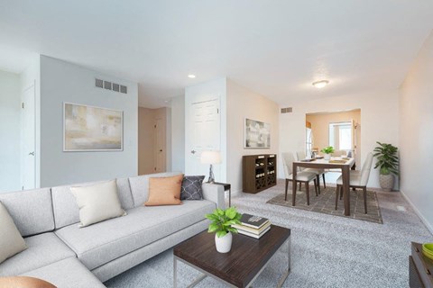 a living room with a couch and a table