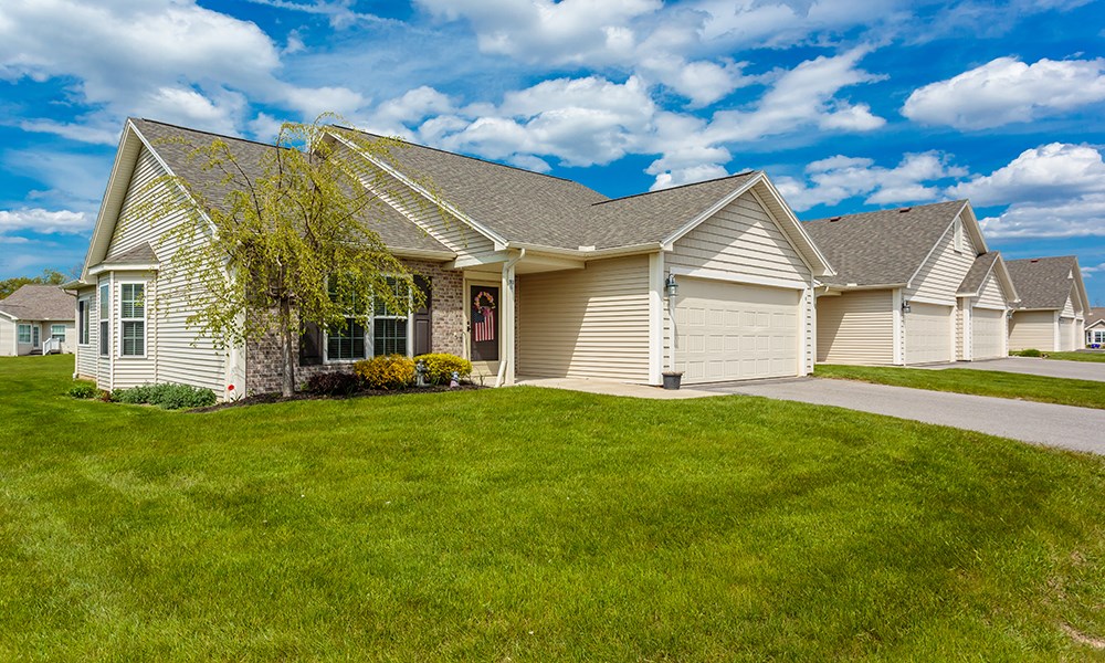 a house with a lawn in front of it