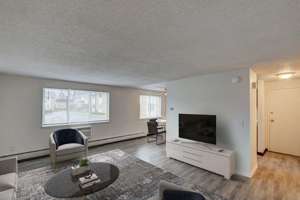 a living room with a couch and a tv
