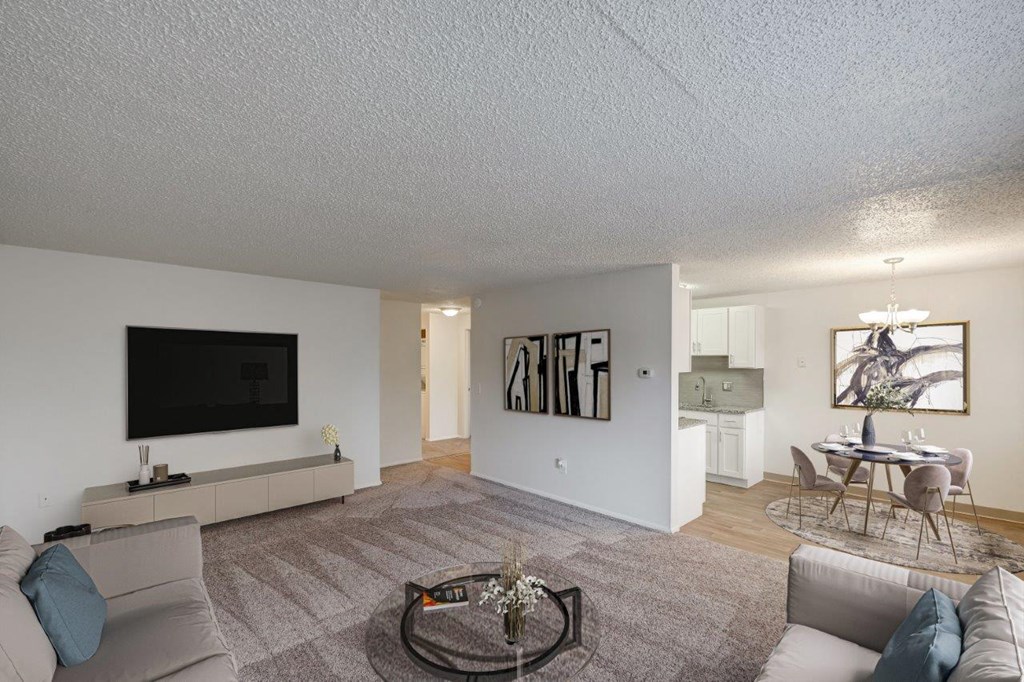 a living room with a couch and a tv