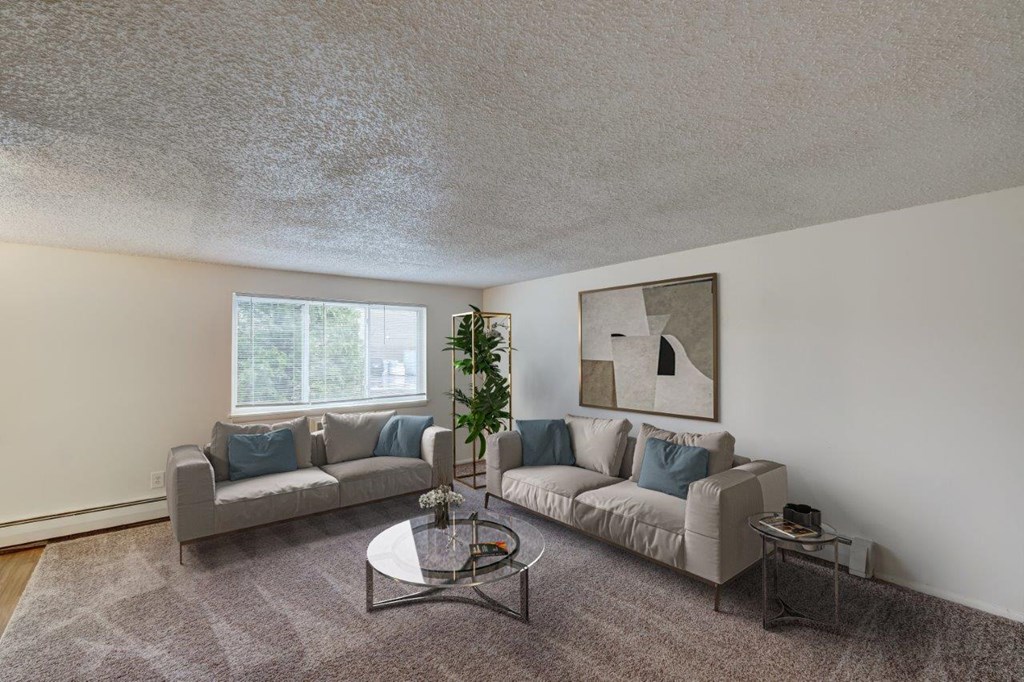 a living room with a couch and a table