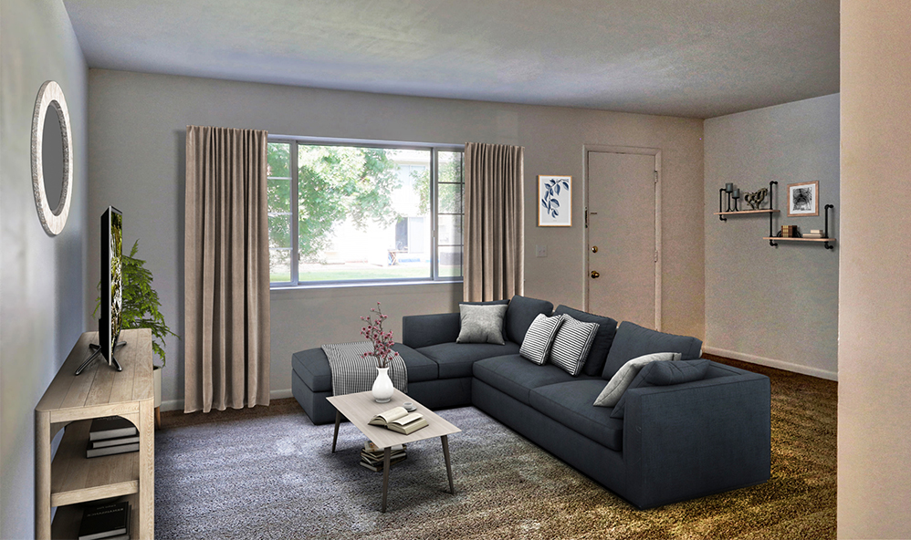 staged living room with wall to wall carpet and large window