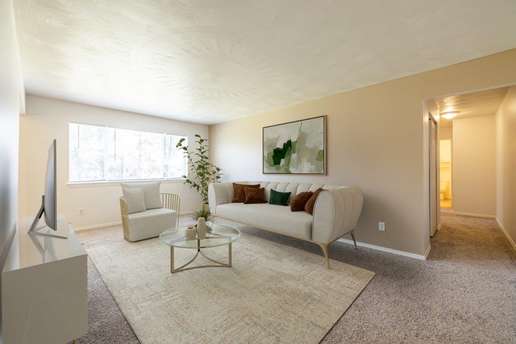 a living room with a couch and a table
