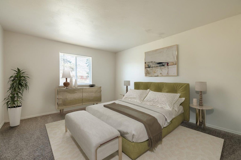 a bedroom with a bed and a window