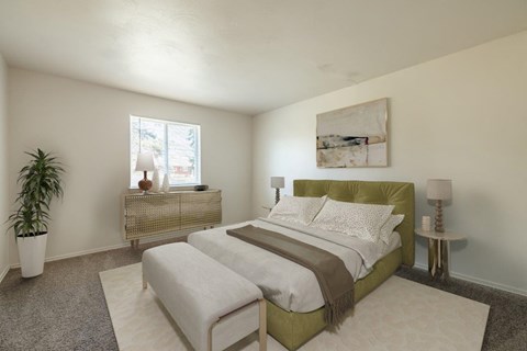 a bedroom with a bed and a window