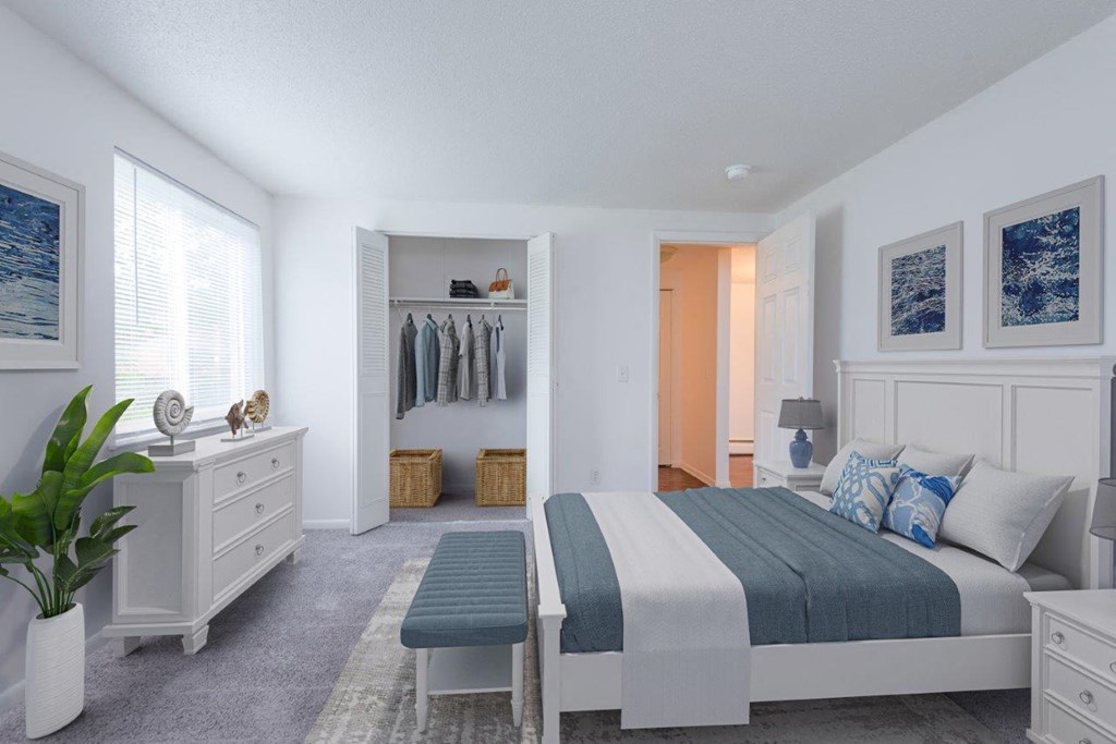 a bedroom with a bed and a closet