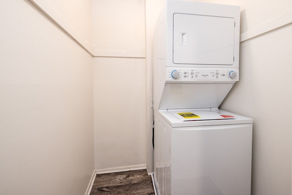 a small laundry room with a washer and dryer in it