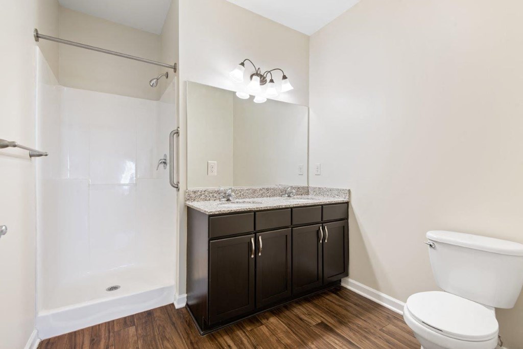 a bathroom with a toilet and a sink