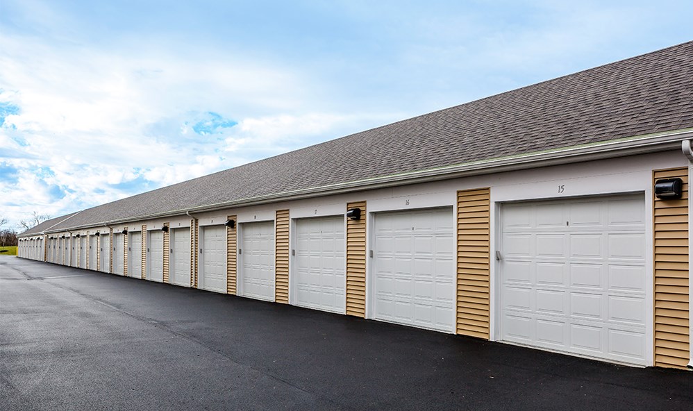 a row of garage doors on the side of a building