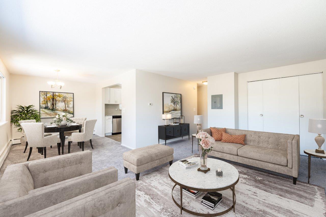 a living room with a couch and a table