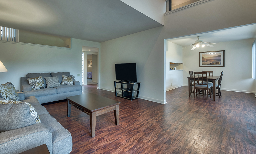 living and dining area with vinyl plank floors