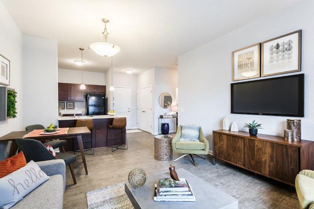 a living room with a couch and a tv