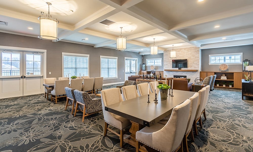 a conference room with a long table and chairs
