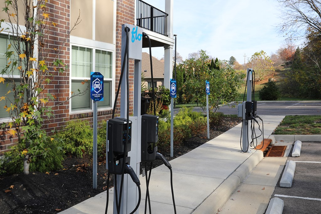 an electric vehicle charging station in front of a building