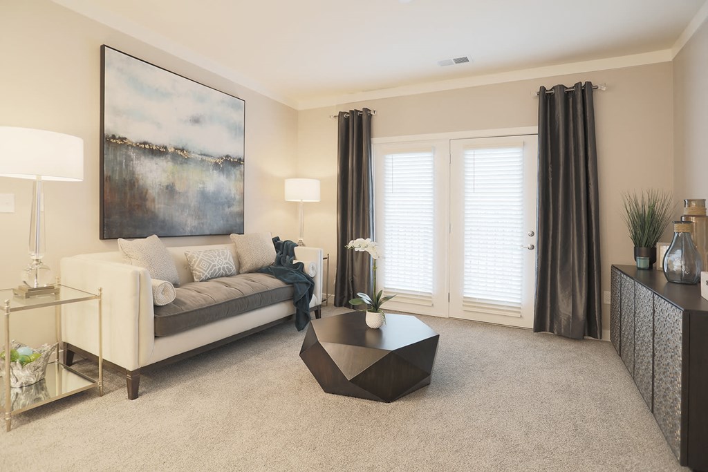 a living room with a couch and a coffee table