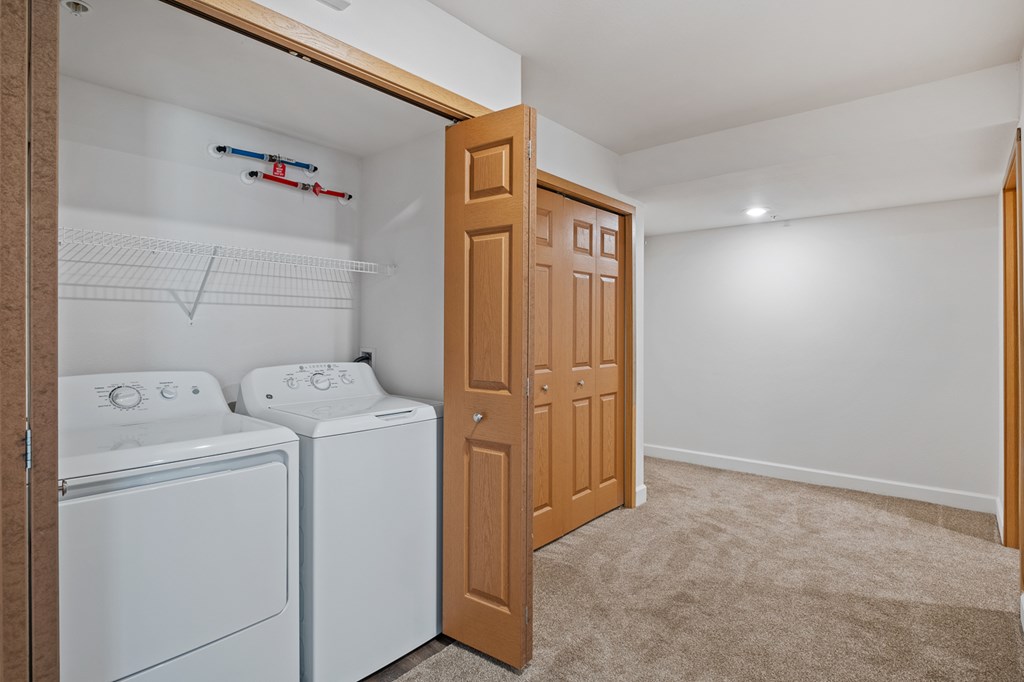 A laundry room with a washer and dryer.