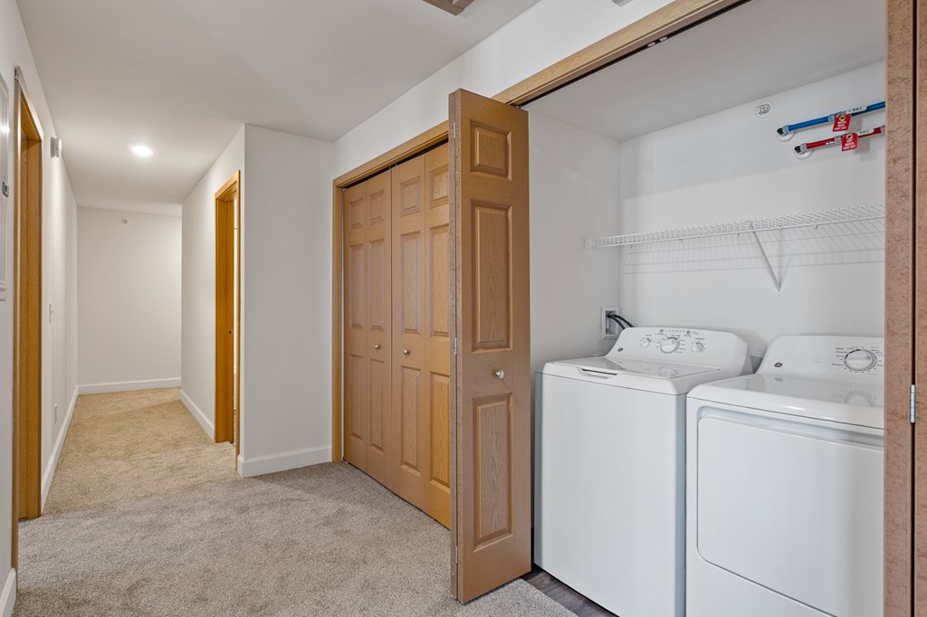 A laundry room with a washer and dryer.