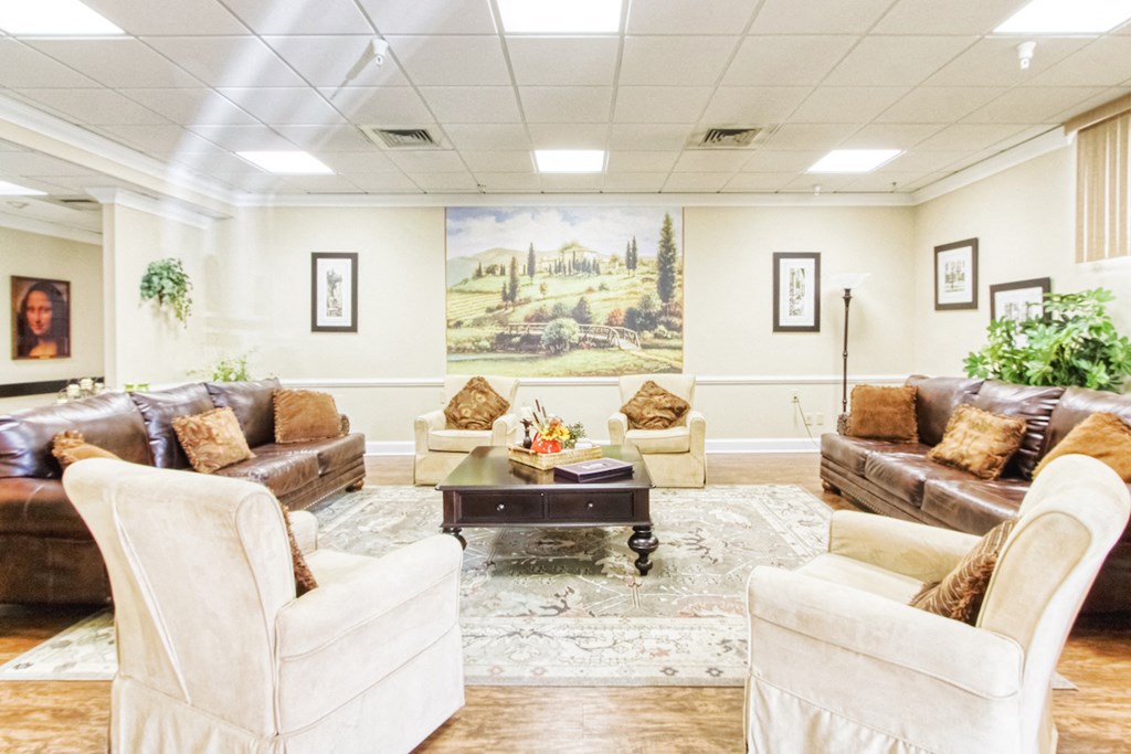 comfortable lobby with couches and chairs and lots of art